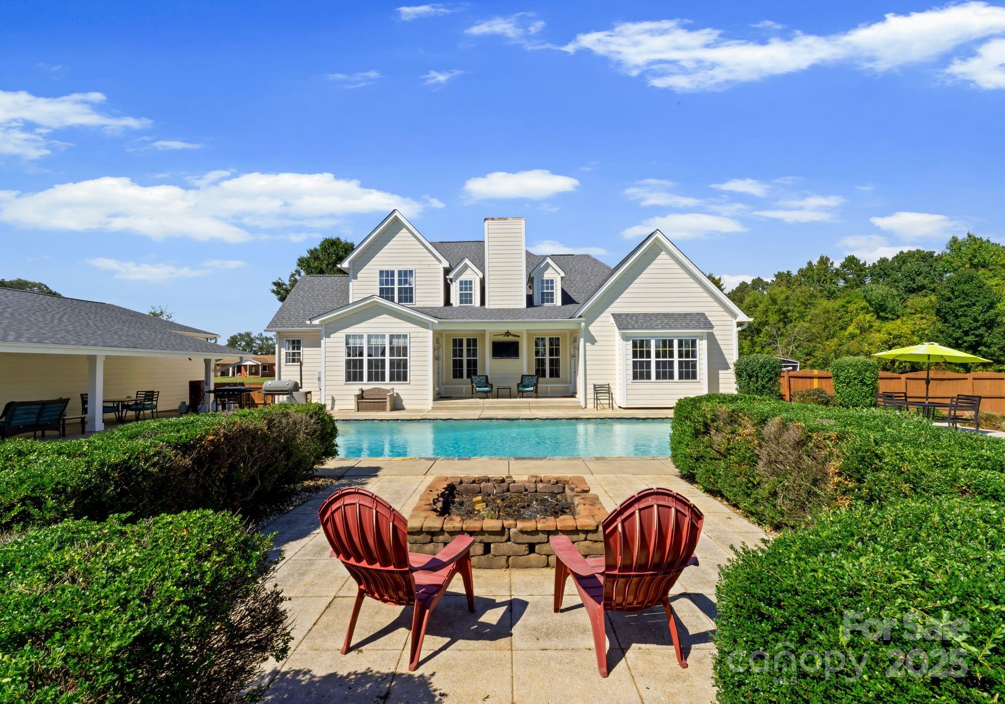 895 East Monbo Road Statesville, NC 28677 - Photo 41 of 44 a view of house with outdoor space and sitting area