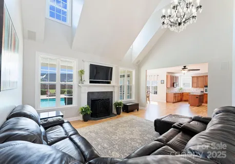 a living room with furniture or couch and a fireplace