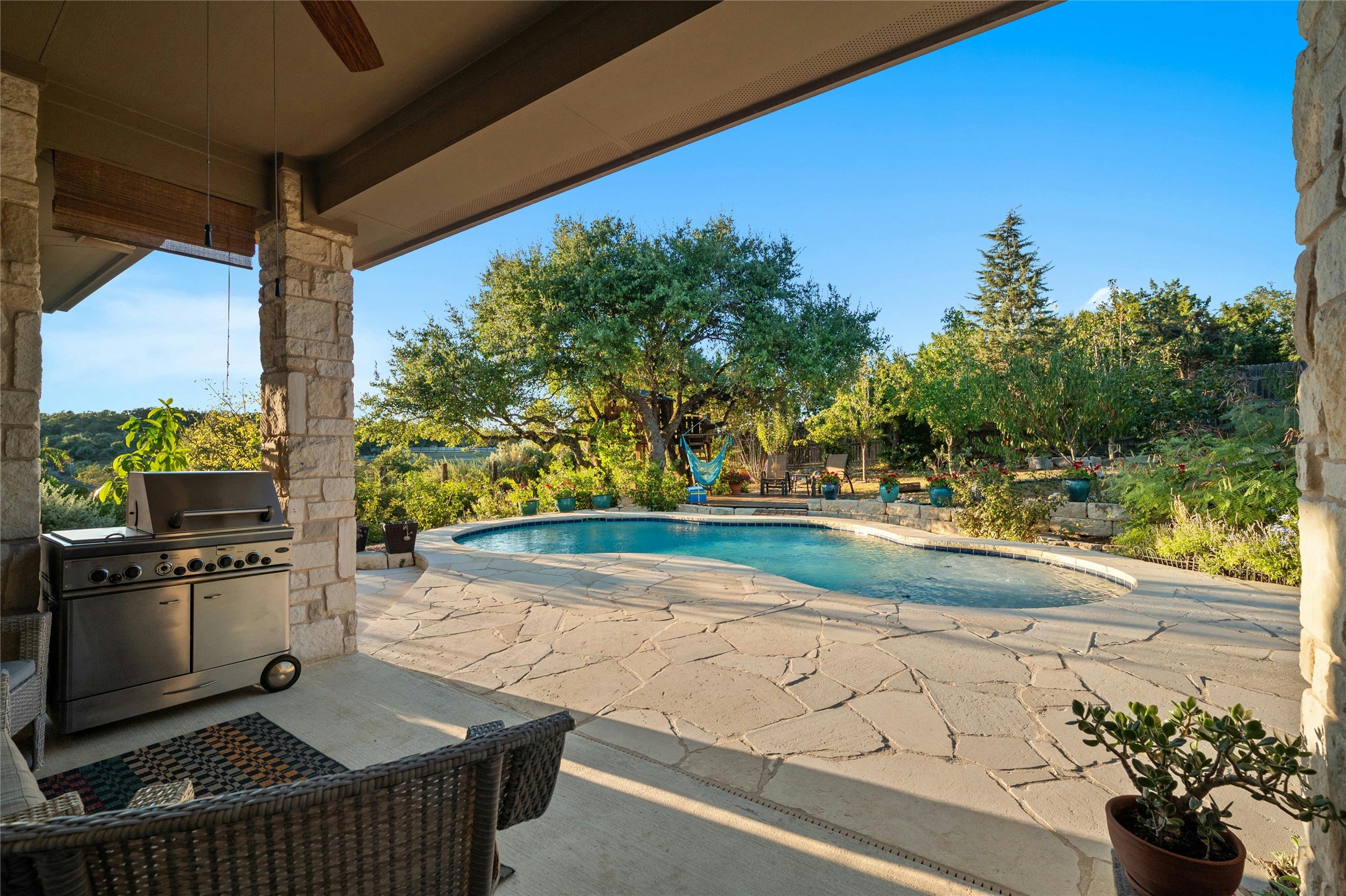 201 Greenridge Lane Dripping Springs, TX 78620 - Photo 20 of 29 Swimming pool featuring a coveredpatio area
