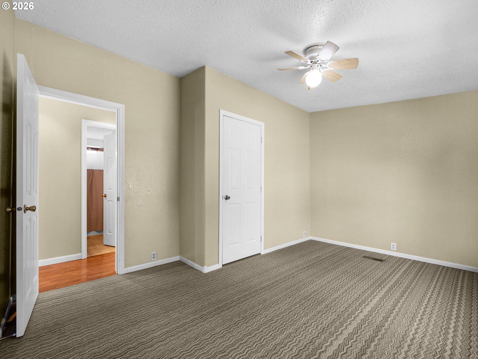 44176 Highway 30 Astoria, OR 97103 - Photo 16 of 32 a view of an empty room with wooden floor