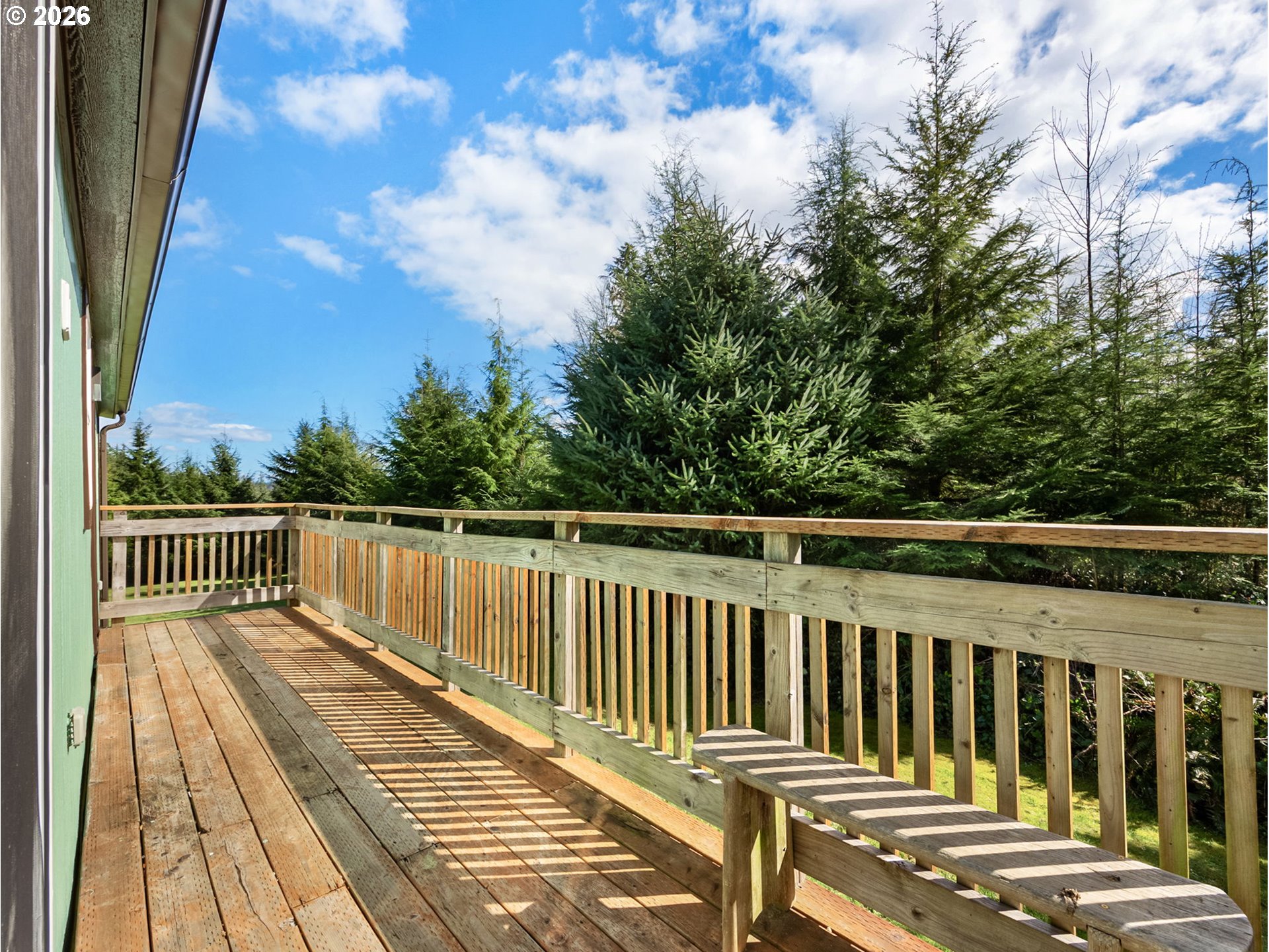 44176 Highway 30 Astoria, OR 97103 - Photo 23 of 32 a view of balcony with wooden floor and fence