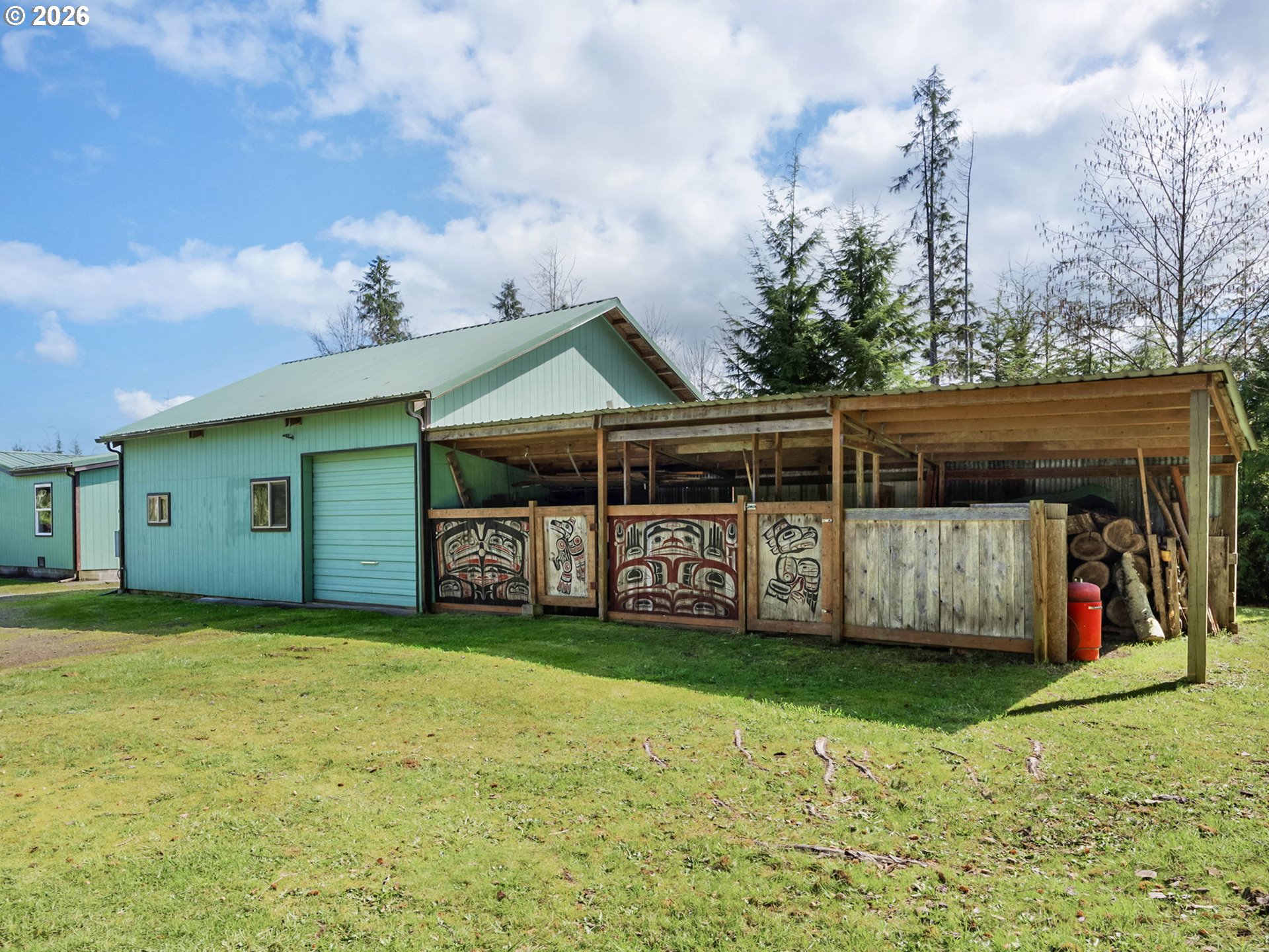 44176 Highway 30 Astoria, OR 97103 - Photo 24 of 32 a view of a house with a yard