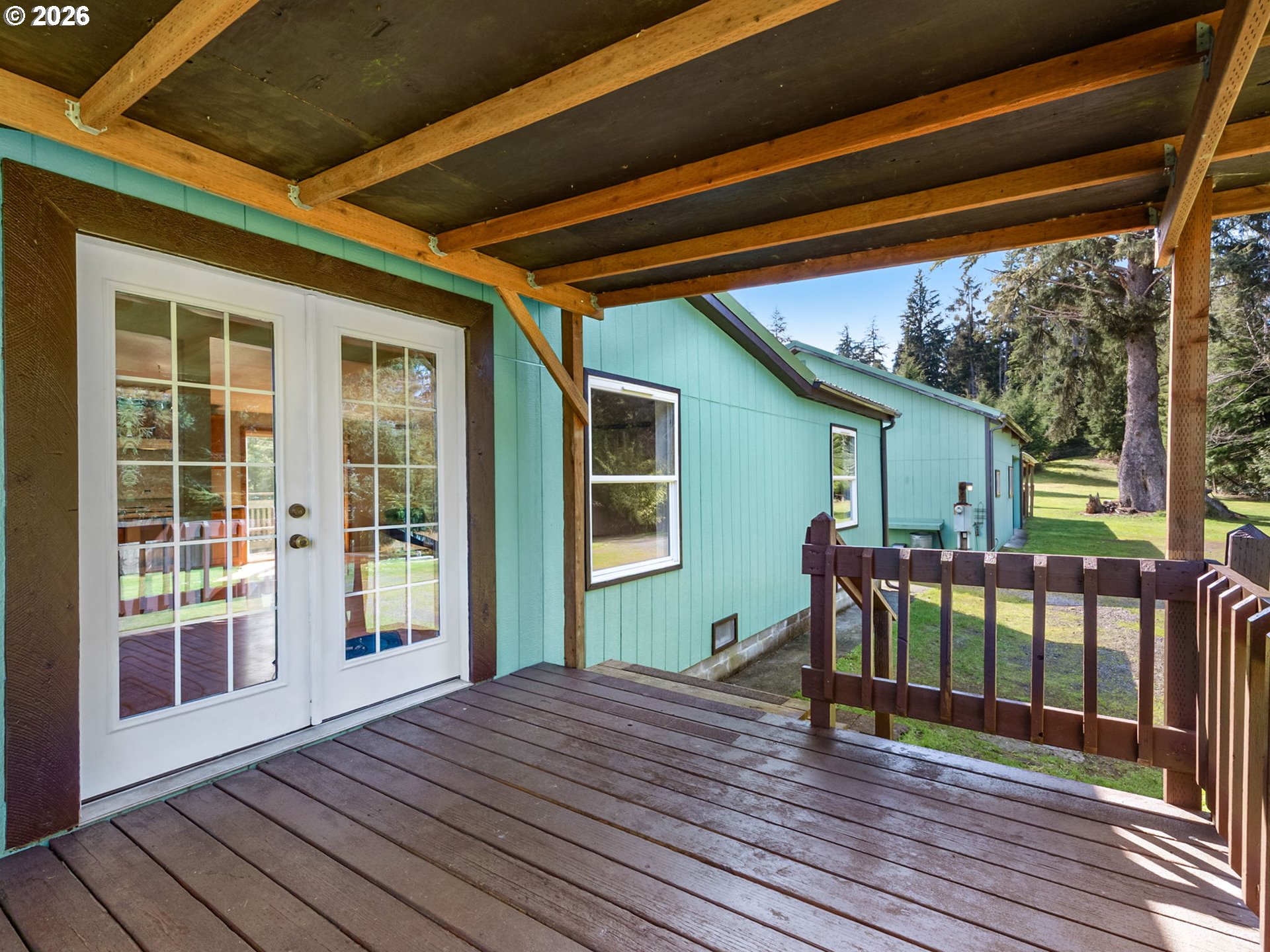 44176 Highway 30 Astoria, OR 97103 - Photo 3 of 32 a view of a house with wooden deck