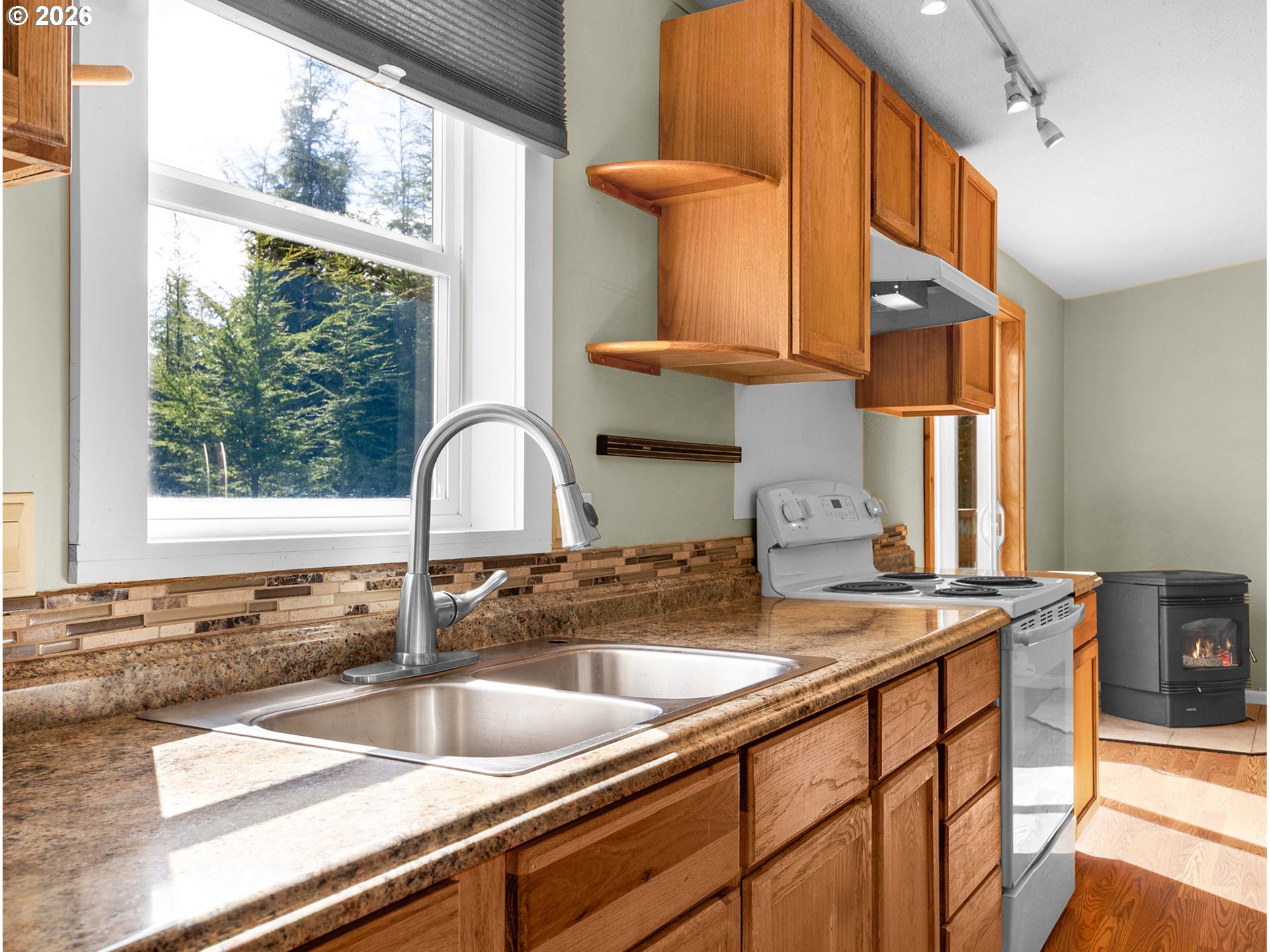 44176 Highway 30 Astoria, OR 97103 - Photo 6 of 32 a kitchen with a sink and a window