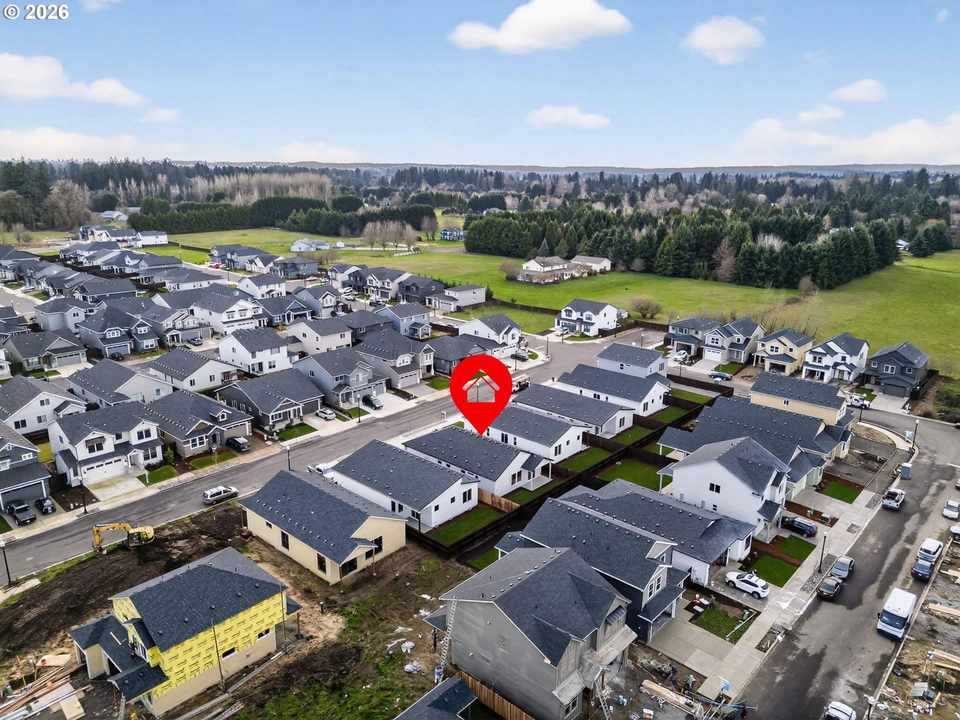734 Southeast 35th Street Battle Ground, WA 98604 - Photo 42 of 42 an aerial view of a city with lots of residential buildings and ocean view in back