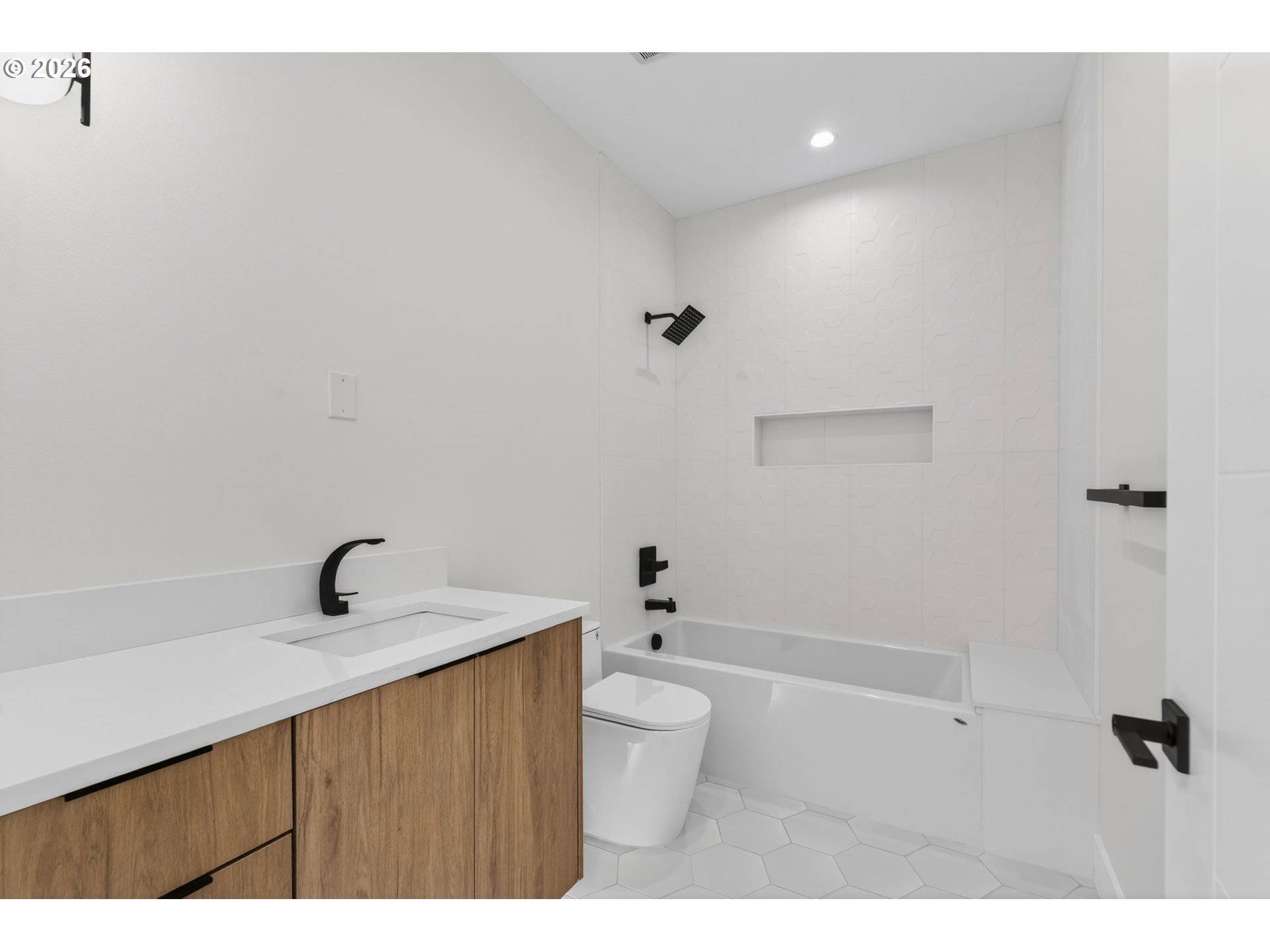 734 Southeast 35th Street Battle Ground, WA 98604 - Photo 8 of 42 a bathroom with a sink a toilet and shower