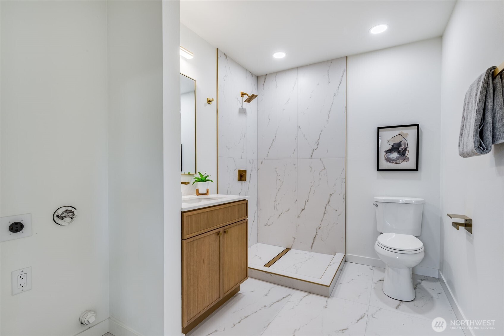 4922 Northeast 20th Place Renton, WA 98059 - Photo 20 of 38 a bathroom with a toilet sink and shower