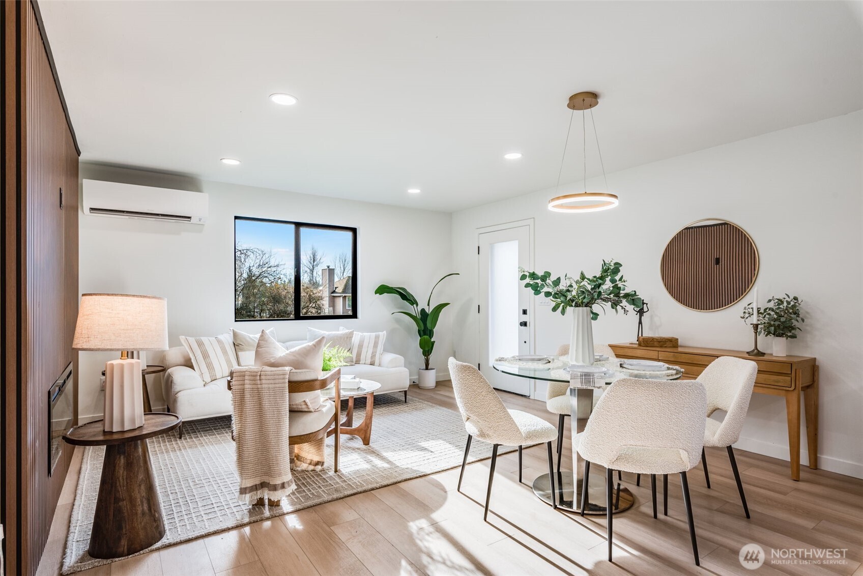4922 Northeast 20th Place Renton, WA 98059 - Photo 3 of 38 a dining room with furniture and wooden floor