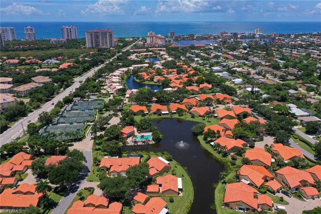 839 Reef Point Circle, Unit 41 Naples, FL 34108 - Photo 27 of 37 an aerial view of residential houses with outdoor space