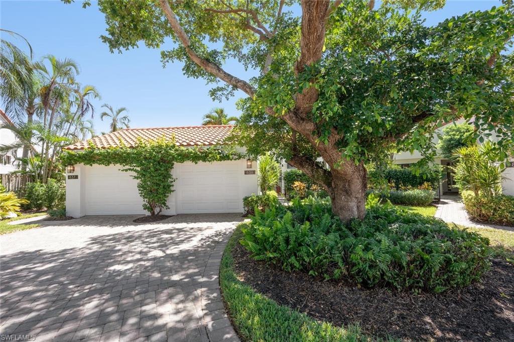 839 Reef Point Circle, Unit 41 Naples, FL 34108 - Photo 3 of 37 a view of a plants and trees