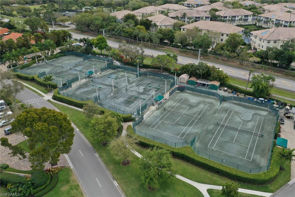 839 Reef Point Circle, Unit 41 Naples, FL 34108 - Photo 35 of 37 an aerial view of residential houses with outdoor space and parking