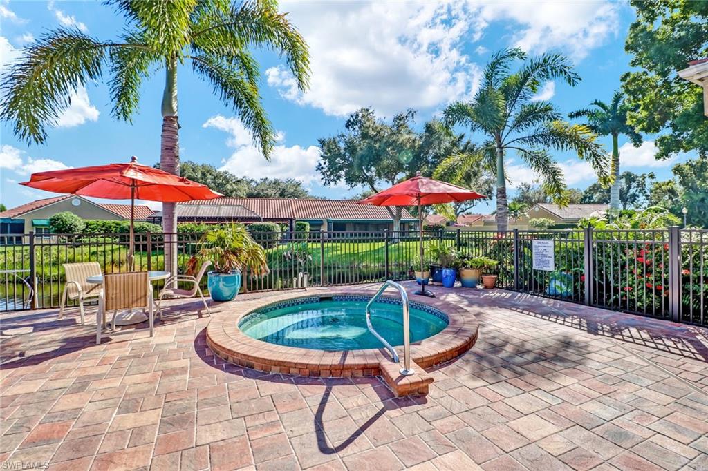 839 Reef Point Circle, Unit 41 Naples, FL 34108 - Photo 37 of 37 a view of a backyard with swimming pool and furniture