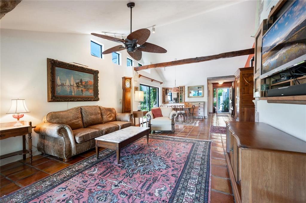 839 Reef Point Circle, Unit 41 Naples, FL 34108 - Photo 10 of 37 a living room with furniture