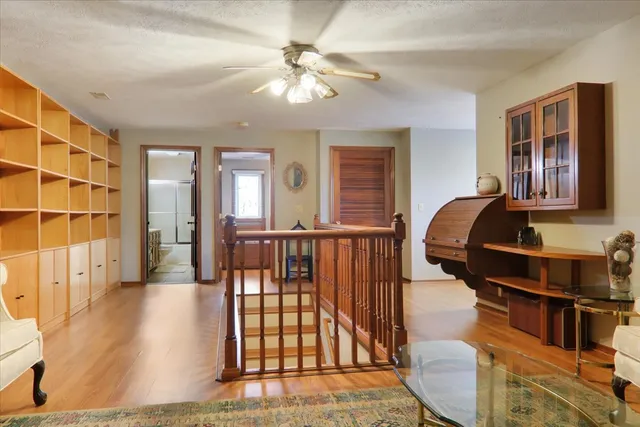 a view of living room with furniture and a rug