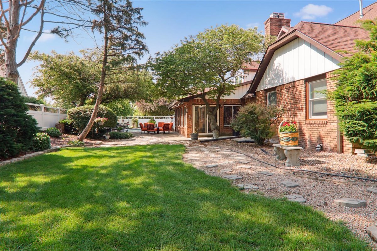 2215 Woodfield Road Bloomington, IL 61704 - Photo 33 of 35 a view of a house with a yard