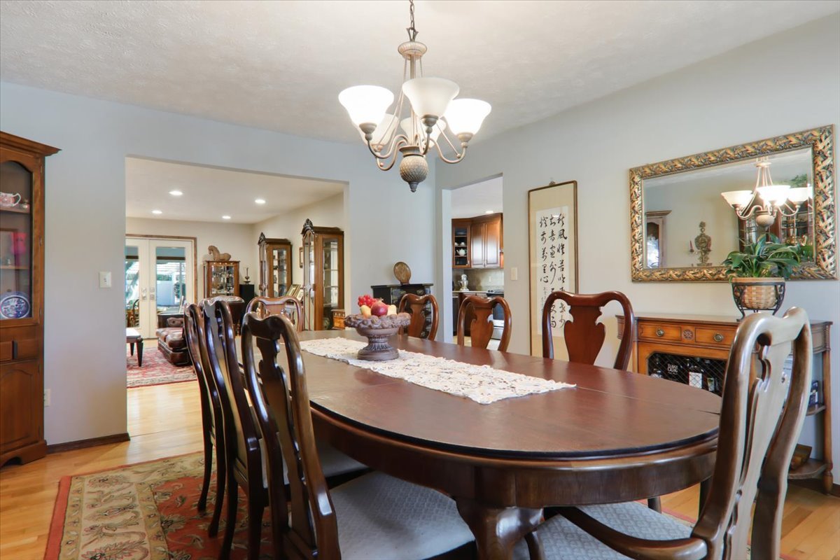 2215 Woodfield Road Bloomington, IL 61704 - Photo 9 of 35 a view of a dining room and livingroom