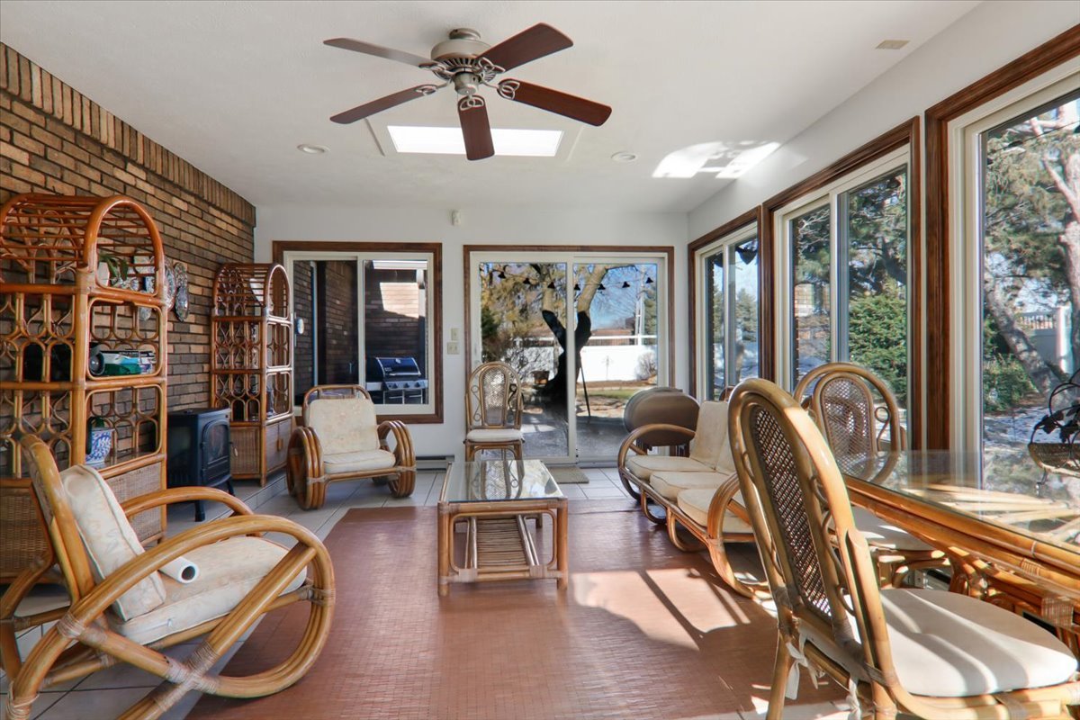 2215 Woodfield Road Bloomington, IL 61704 - Photo 10 of 35 a view of a livingroom with furniture and a large window