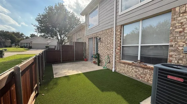 a view of a backyard with a tub