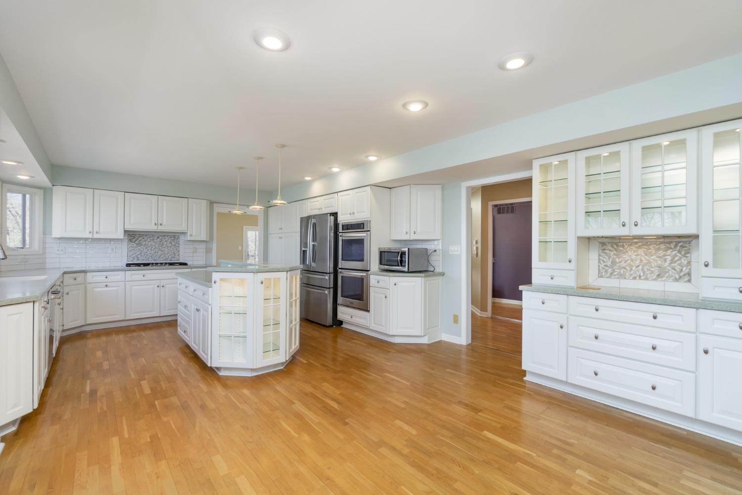 473 Roxbury Road Valparaiso, IN 46385 - Photo 20 of 51 a kitchen with a refrigerator and a stove top oven