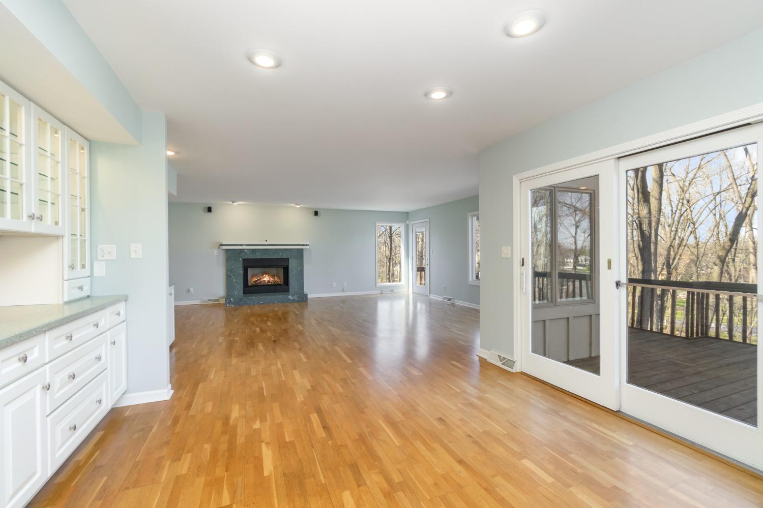 473 Roxbury Road Valparaiso, IN 46385 - Photo 25 of 51 a view of empty room with wooden floor and fireplace