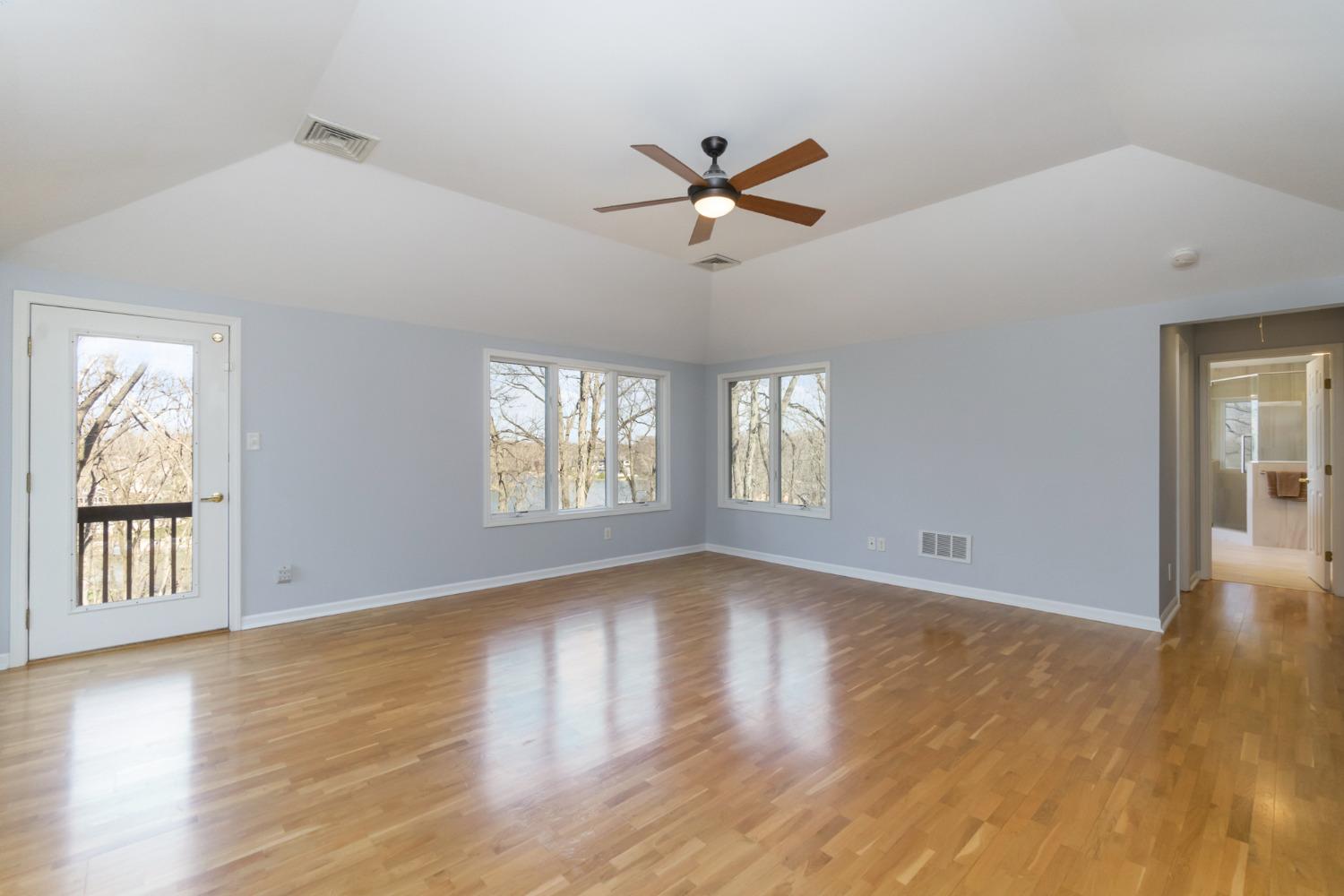 473 Roxbury Road Valparaiso, IN 46385 - Photo 31 of 51 a view of an empty room with wooden floor and a window
