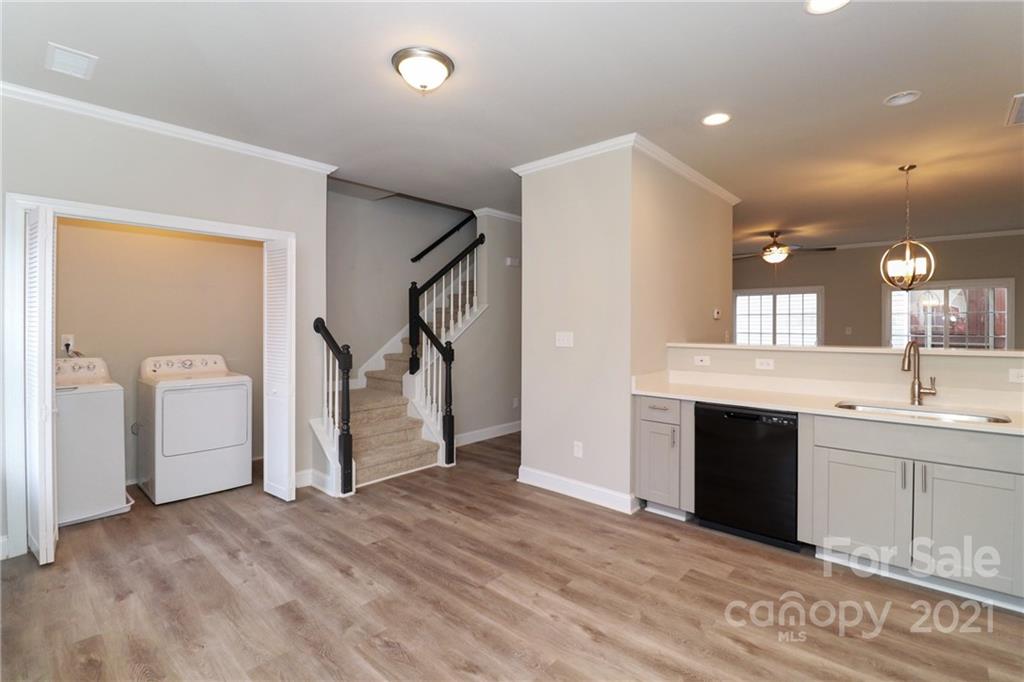 1265 Amber Ridge Road Northwest Concord, NC 28027 - Photo 17 of 26 a view of a big room with closet and windows