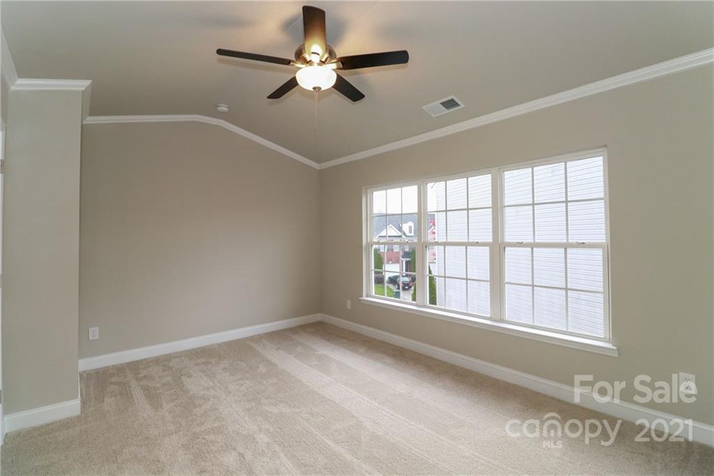 1265 Amber Ridge Road Northwest Concord, NC 28027 - Photo 19 of 26 a view of an empty room with a window