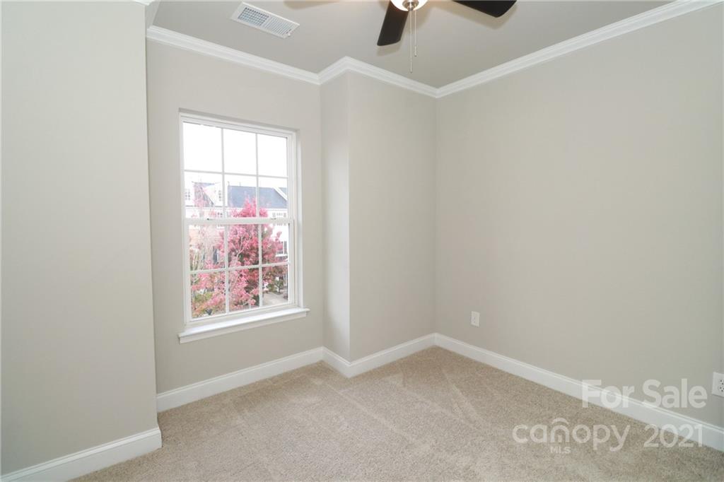 1265 Amber Ridge Road Northwest Concord, NC 28027 - Photo 23 of 26 an empty room with a window
