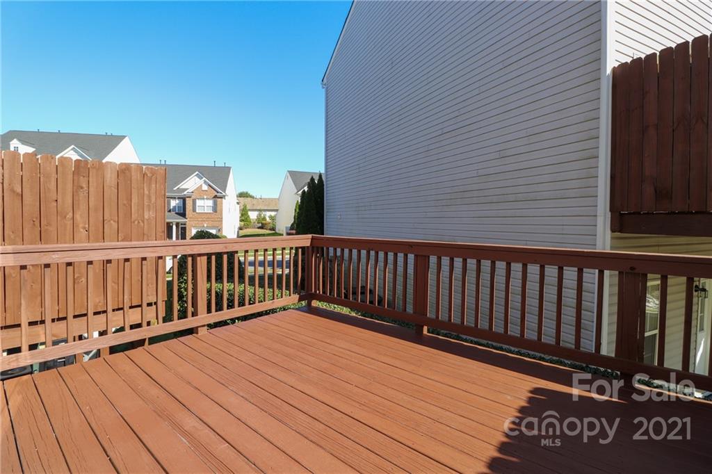 1265 Amber Ridge Road Northwest Concord, NC 28027 - Photo 26 of 26 a balcony with wooden floor