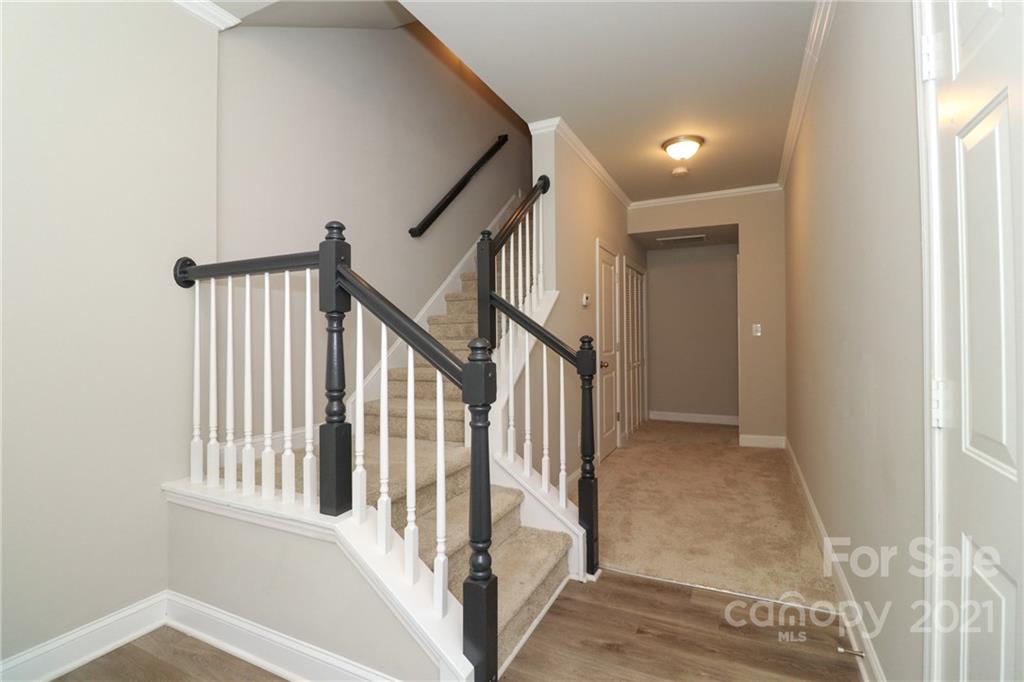 1265 Amber Ridge Road Northwest Concord, NC 28027 - Photo 4 of 26 a view of an entryway with staircase