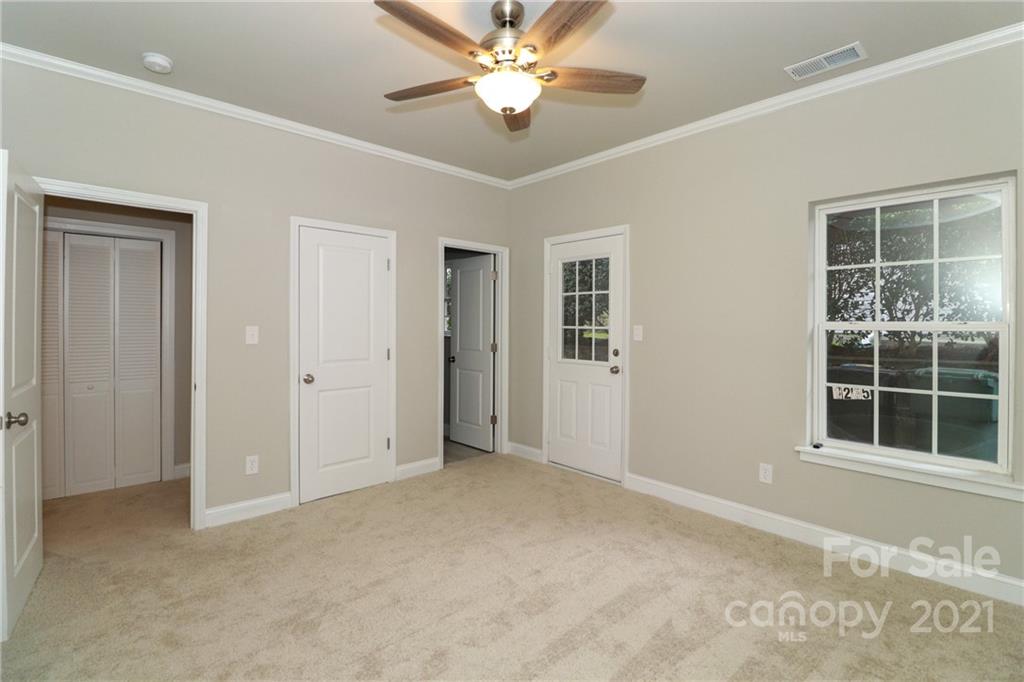 1265 Amber Ridge Road Northwest Concord, NC 28027 - Photo 6 of 26 a view of empty room with window and ceiling fan