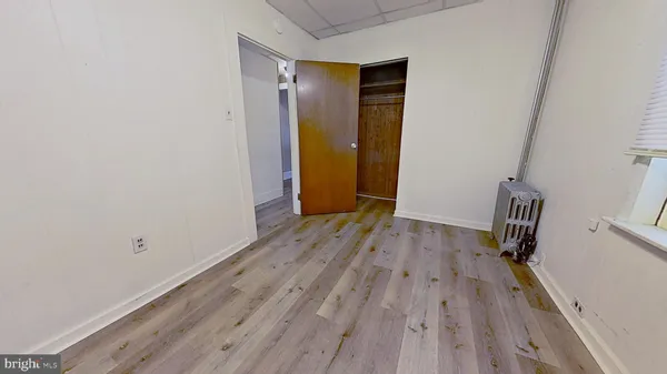 a bathroom with a shower and a toilet