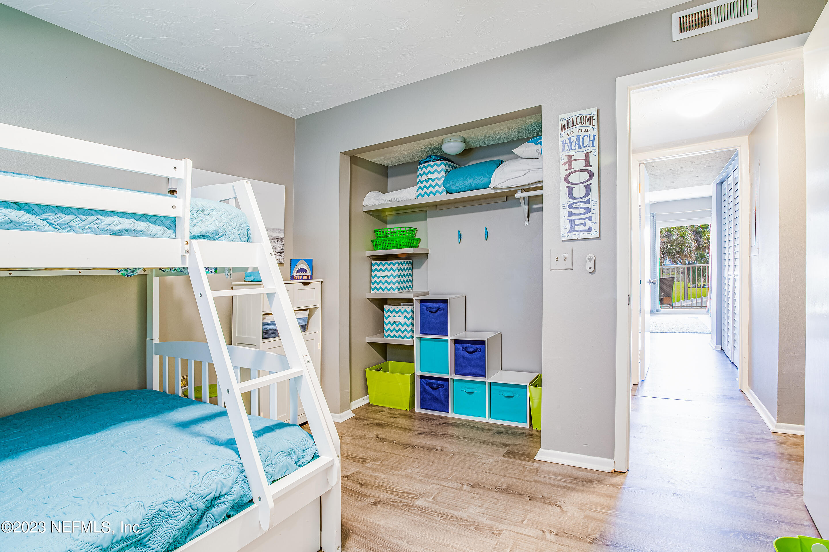4 Ocean Trace Road, Unit 224 St. Augustine, FL 32080 - Photo 11 of 36 a view of a bedroom with bed and workspace