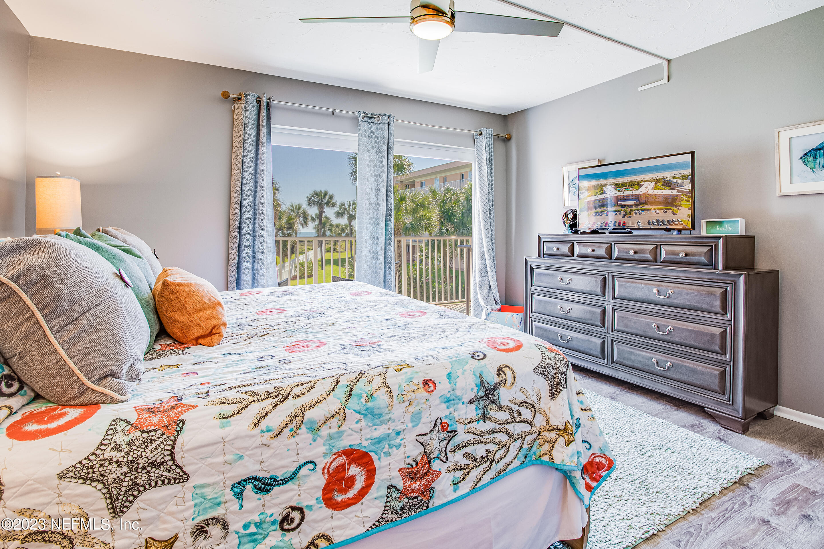 4 Ocean Trace Road, Unit 224 St. Augustine, FL 32080 - Photo 15 of 36 a bedroom with a bed and dresser