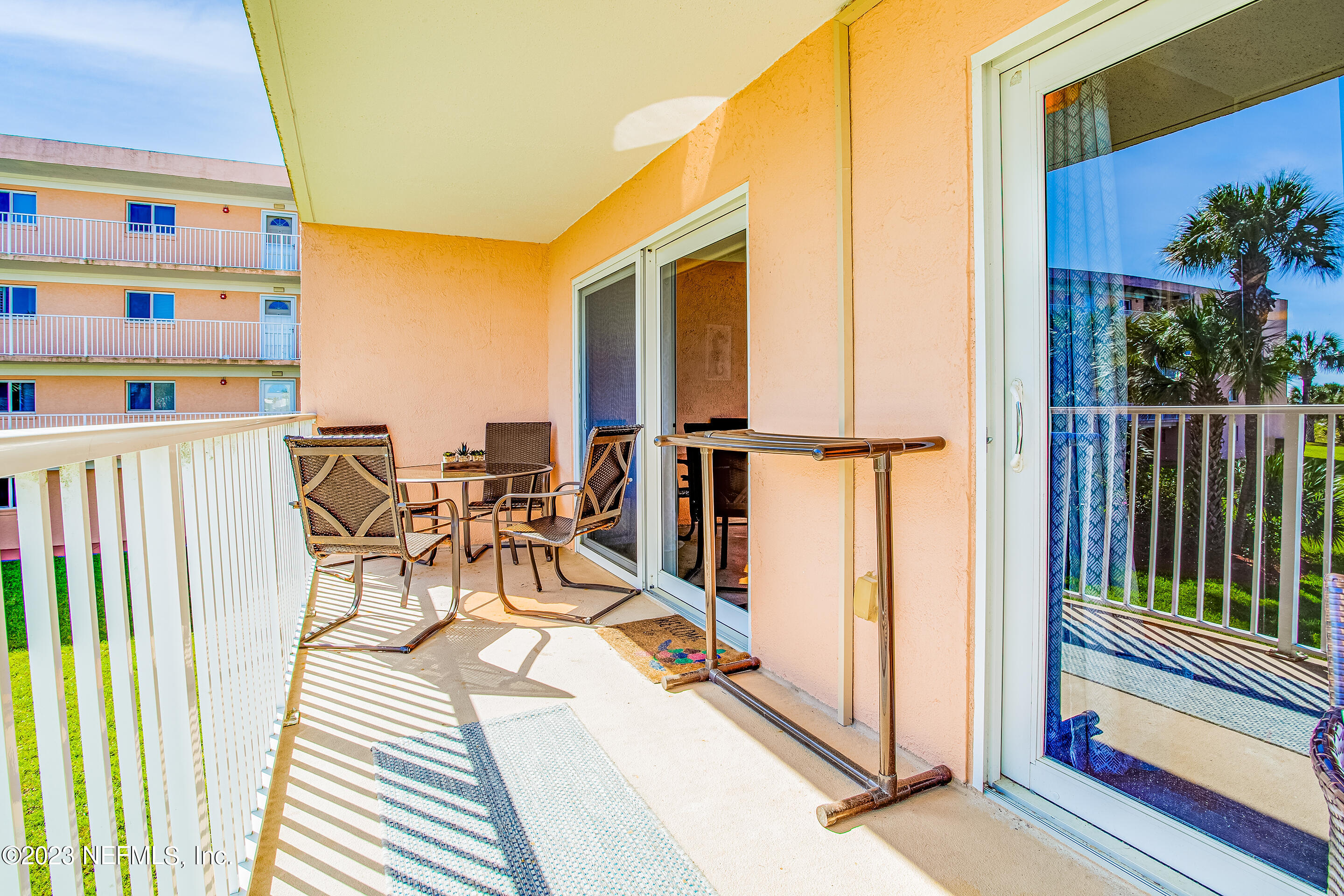 4 Ocean Trace Road, Unit 224 St. Augustine, FL 32080 - Photo 18 of 36 a view of a balcony with chairs