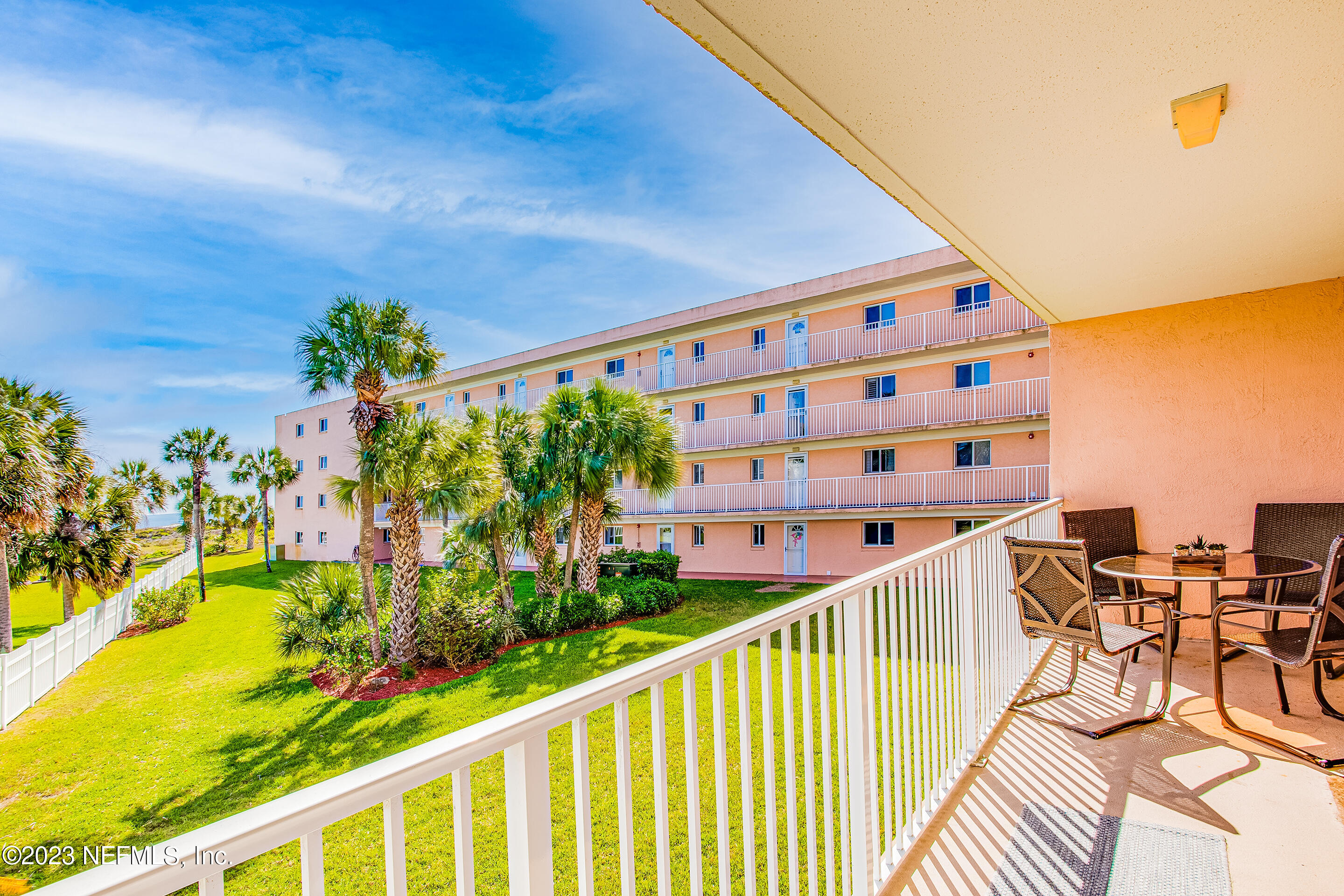 4 Ocean Trace Road, Unit 224 St. Augustine, FL 32080 - Photo 19 of 36 a view of a balcony with chairs
