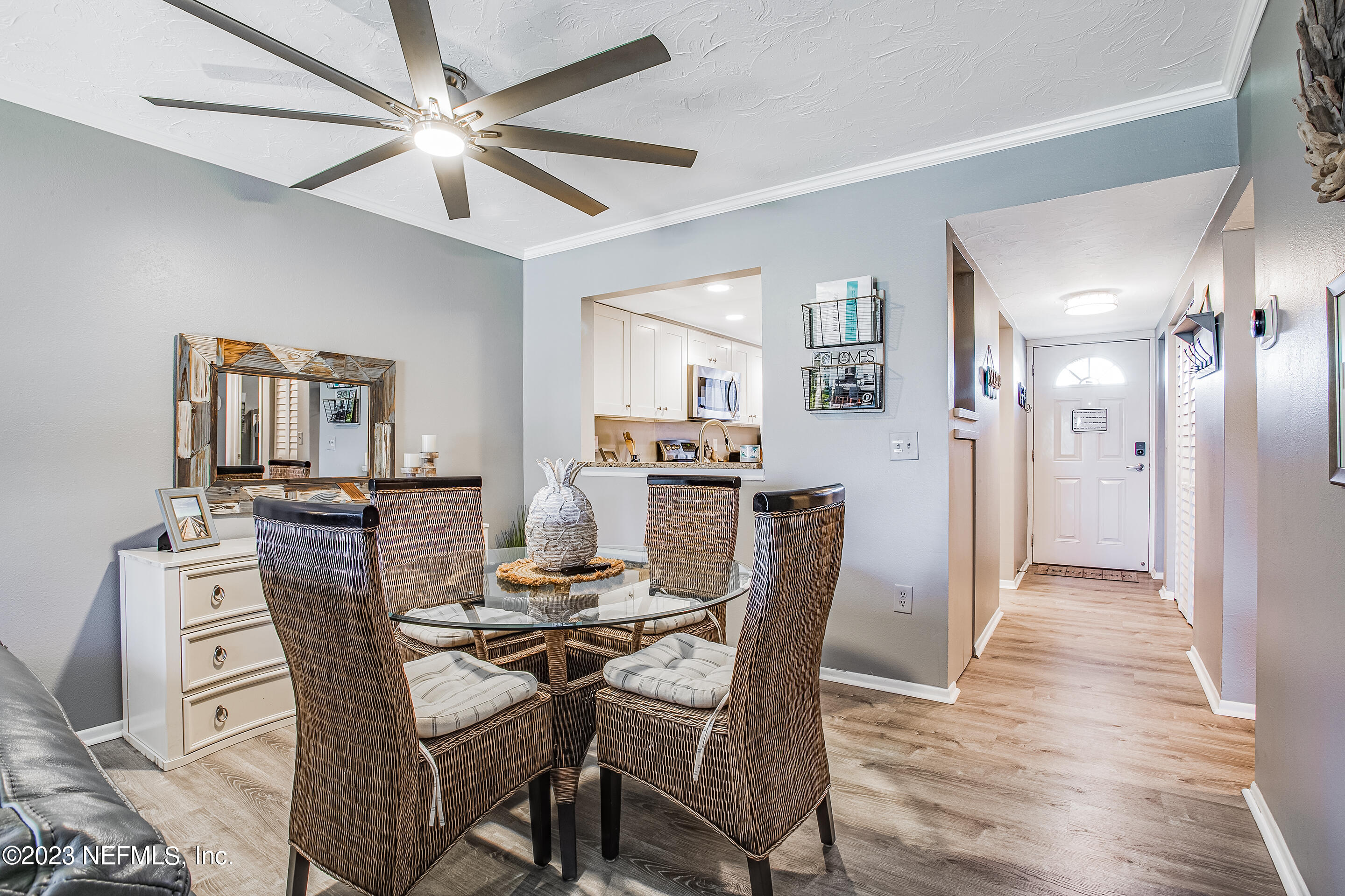 4 Ocean Trace Road, Unit 224 St. Augustine, FL 32080 - Photo 6 of 36 a dining room with furniture and window