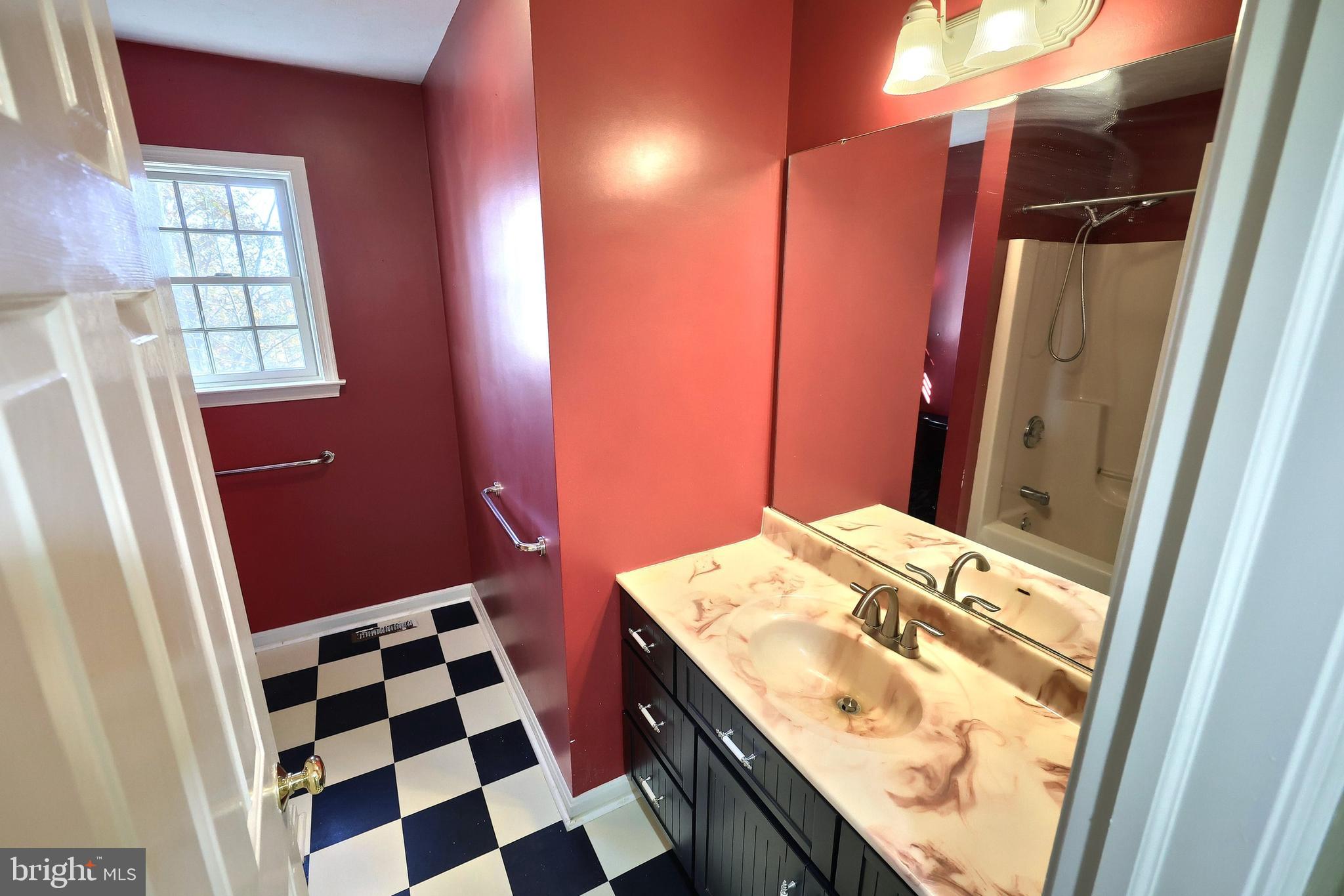 65 Scarlet Way Biglerville, PA 17307 - Photo 17 of 34 a bathroom with a sink and a mirror