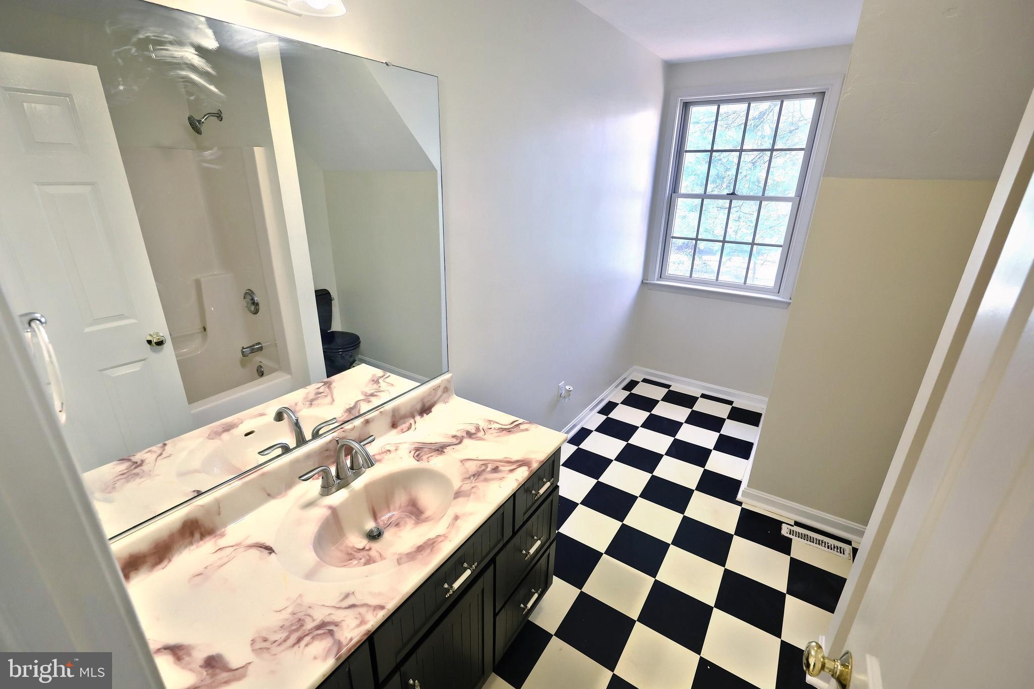 65 Scarlet Way Biglerville, PA 17307 - Photo 18 of 34 a bedroom with a bed and a window