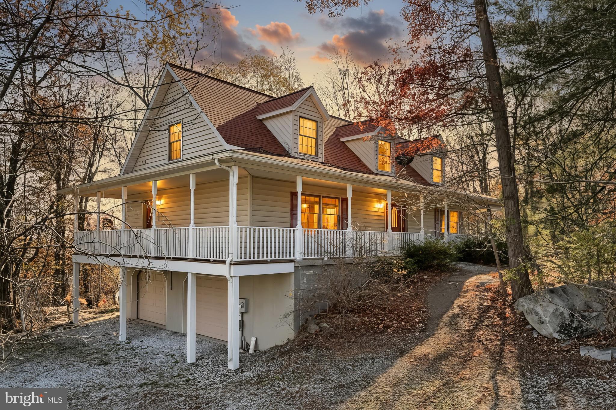 65 Scarlet Way Biglerville, PA 17307 - Photo 2 of 34 a front view of a house with a yard and garage
