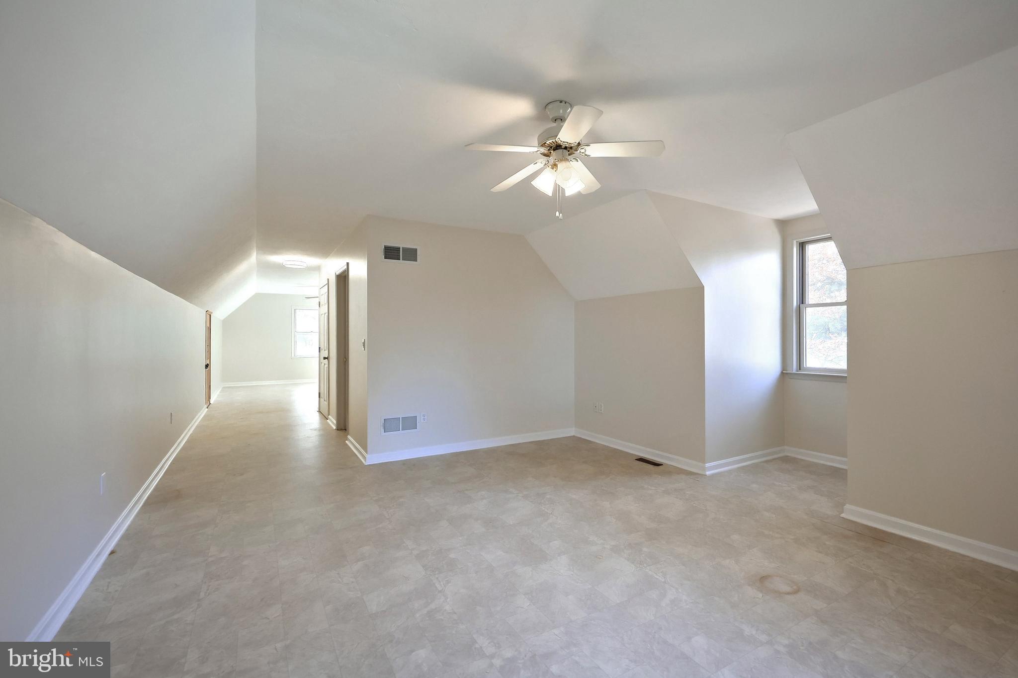 65 Scarlet Way Biglerville, PA 17307 - Photo 22 of 34 an empty room with fan and windows