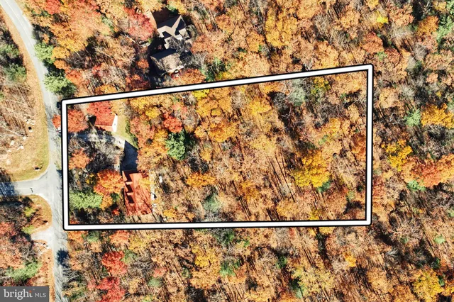 a view of a balcony with wooden floor
