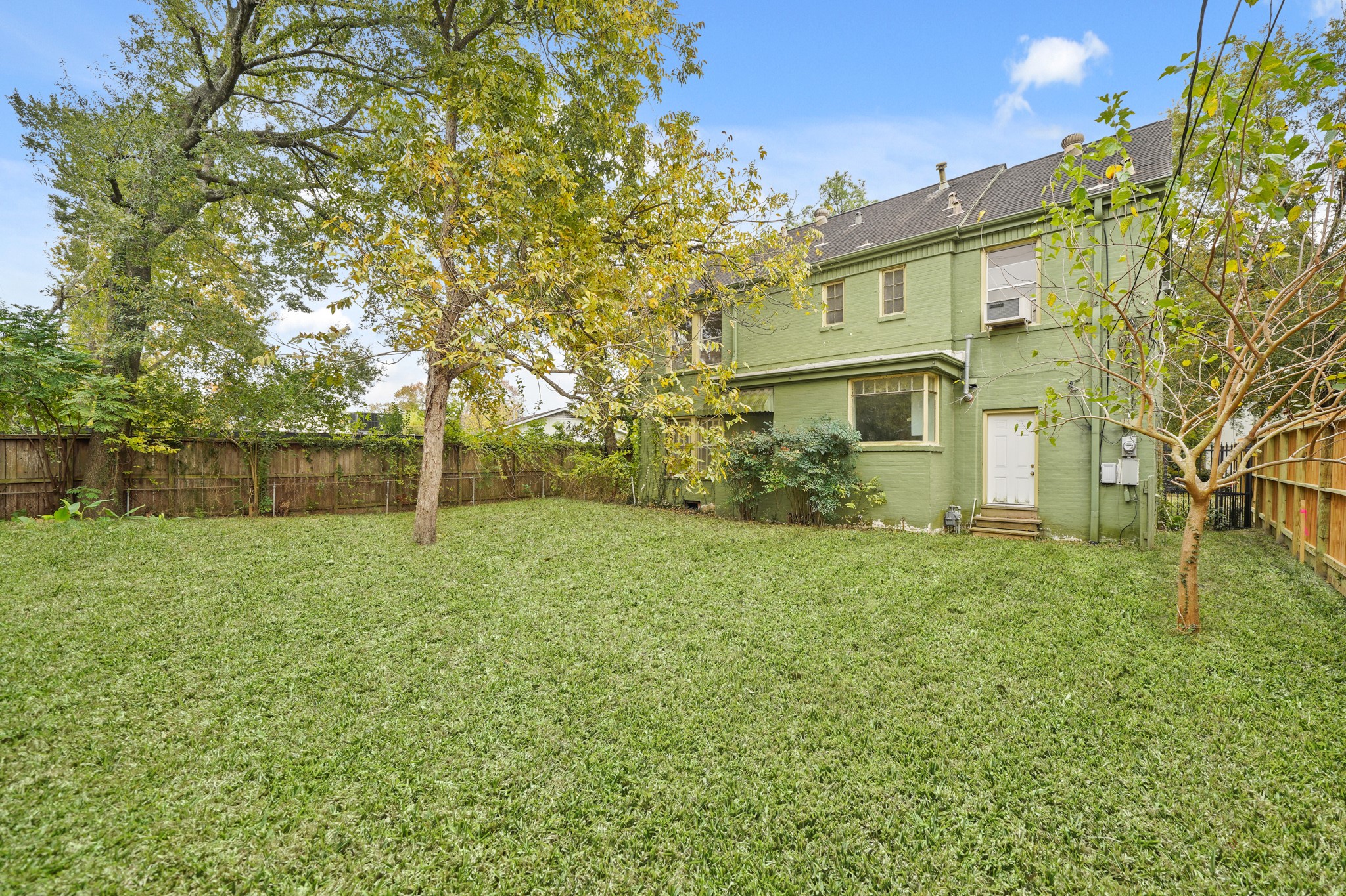 4375 Faculty Lane Houston, TX 77004 - Photo 9 of 24 View of backyard. Pecan tree in the back.