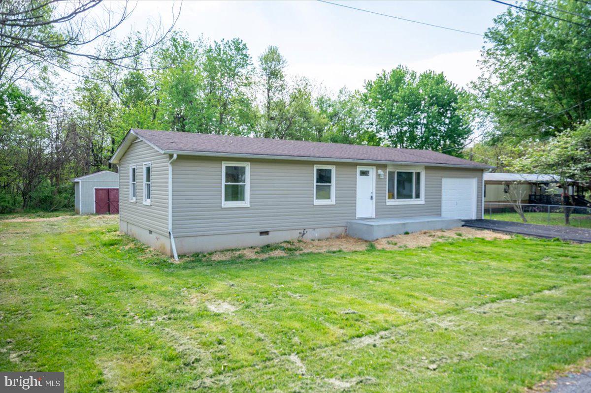 Charming home with spacious yard.