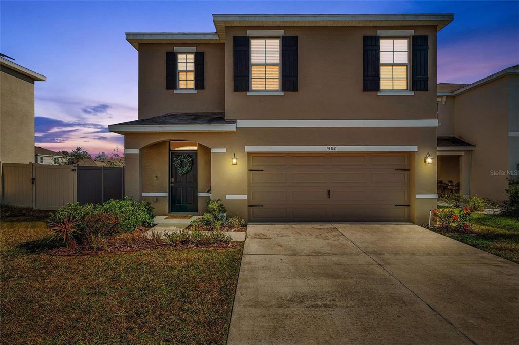 1580 Bering Road Wesley Chapel, FL 33543 - Photo 1 of 1 Exterior -Twilight Robi Floor Plan