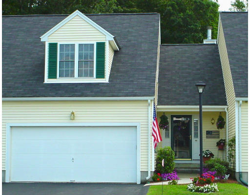 31 Cold Spring Drive, Unit C Sutton, MA 01590 - Photo 1 of 20 a front view of a house with an outdoor space