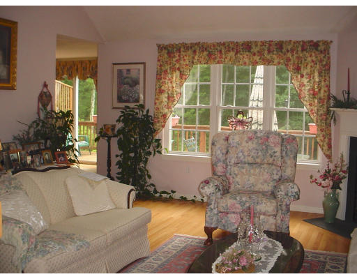 31 Cold Spring Drive, Unit C Sutton, MA 01590 - Photo 2 of 20 a living room filled with furniture