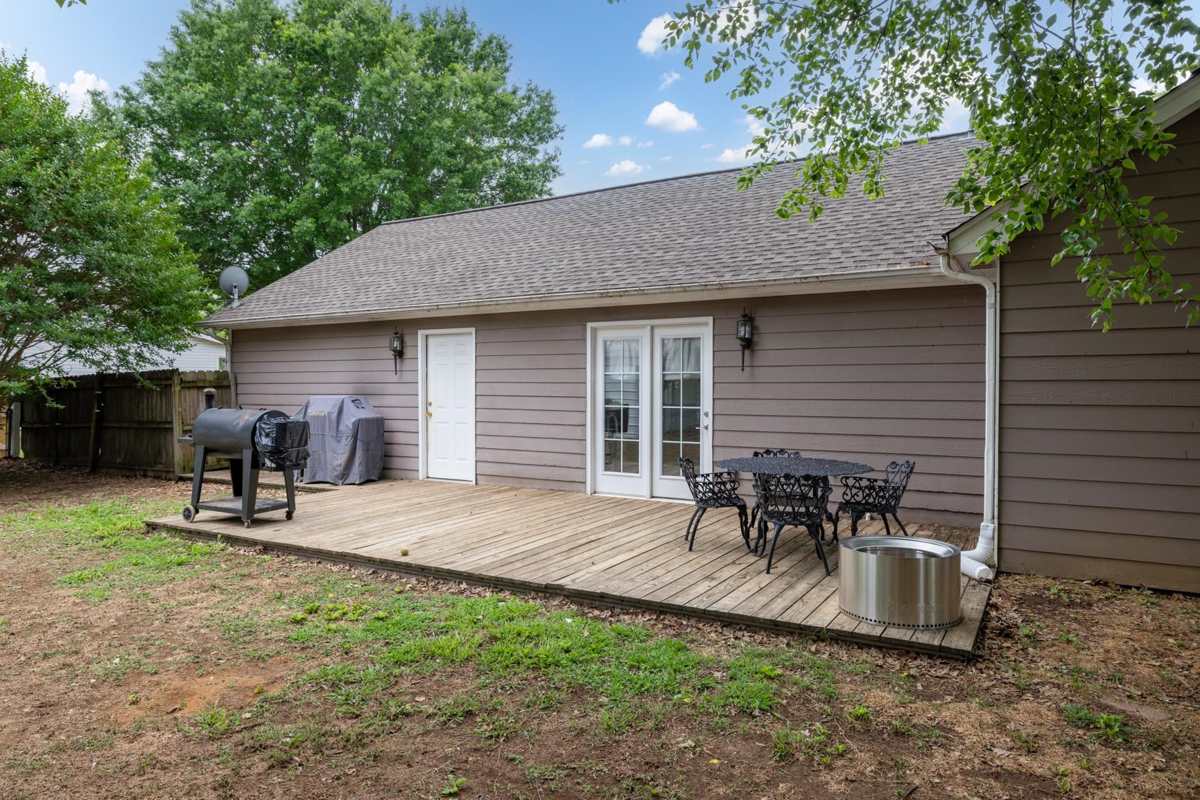 586 Beaver Road Munford, TN 38058 - Photo 17 of 21 Wood deck patio with white French doors