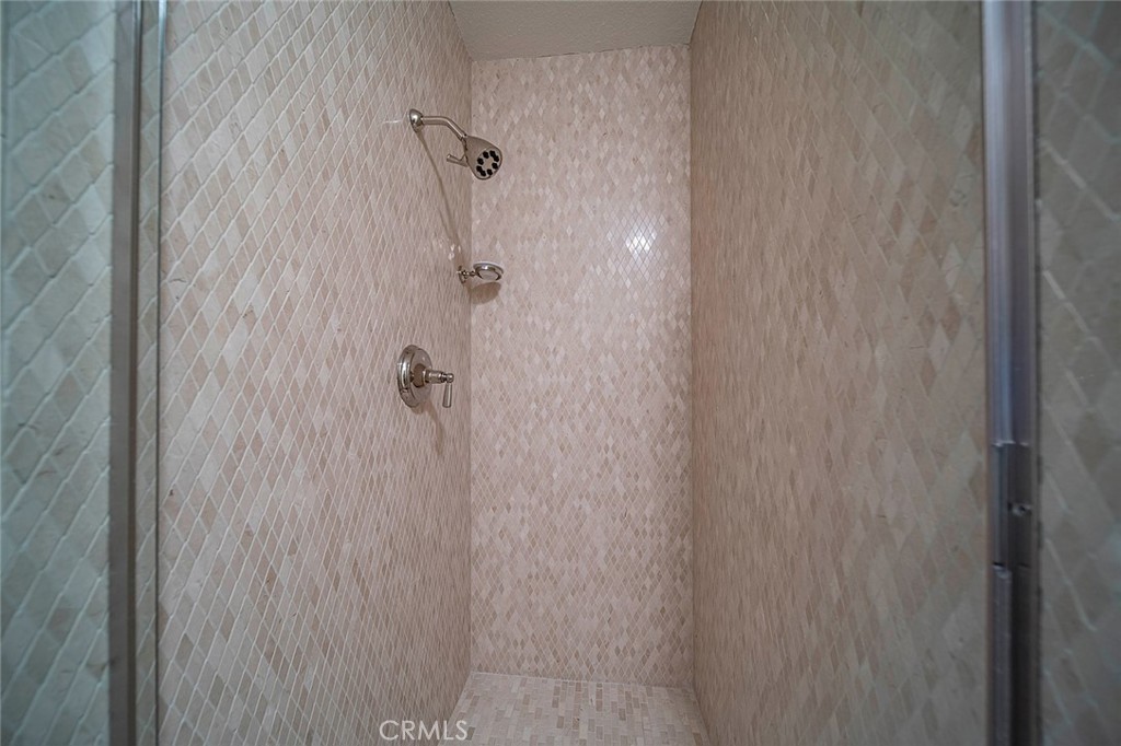 612 Karenken Pines Drive Lake Arrowhead, CA 92391 - Photo 28 of 44 a bathroom with a shower