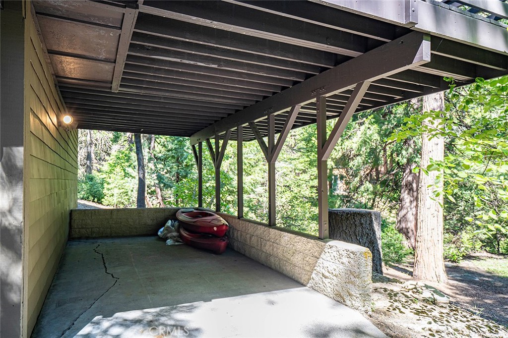 612 Karenken Pines Drive Lake Arrowhead, CA 92391 - Photo 43 of 44 a car parked in front of a house